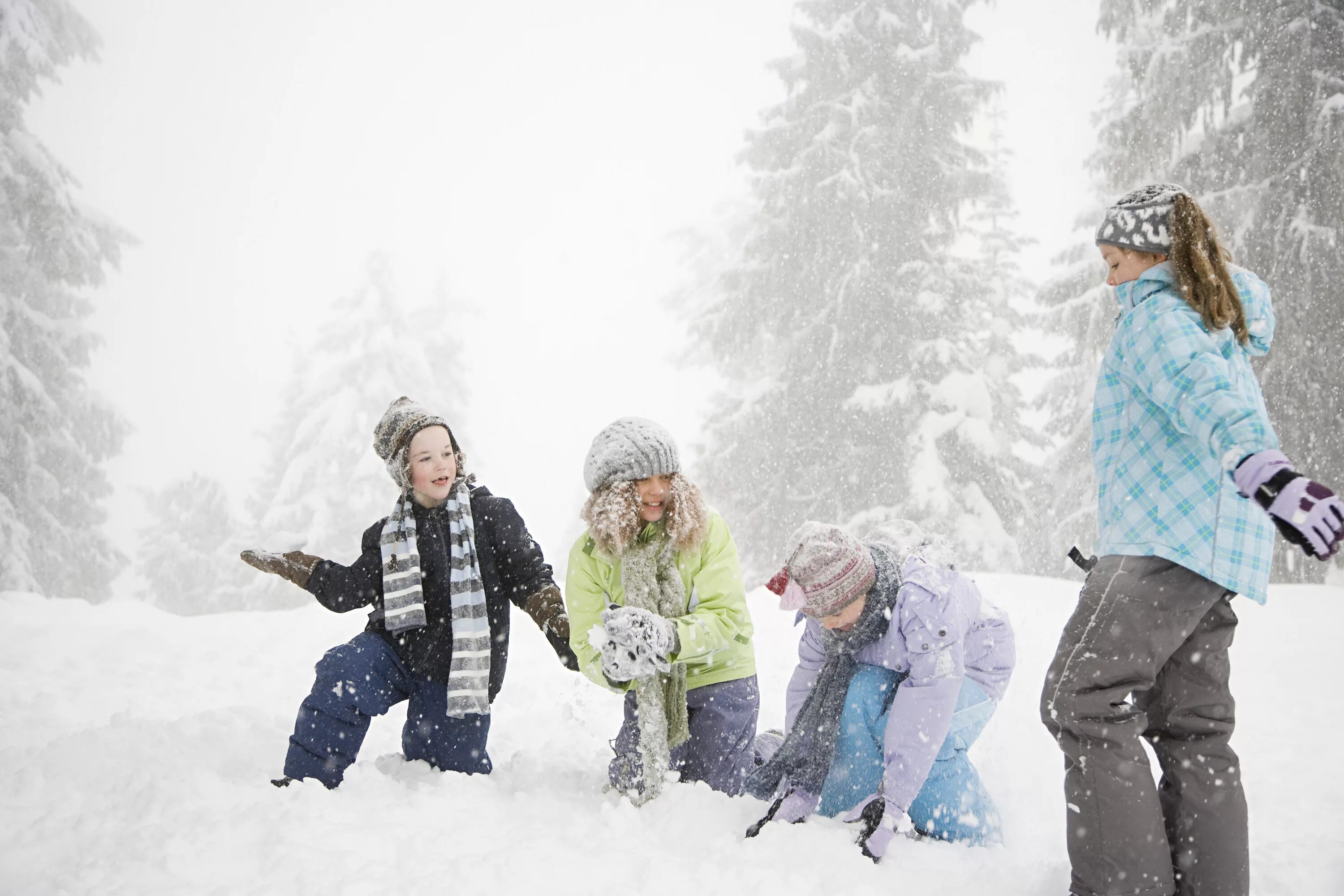 Child playing in the snow