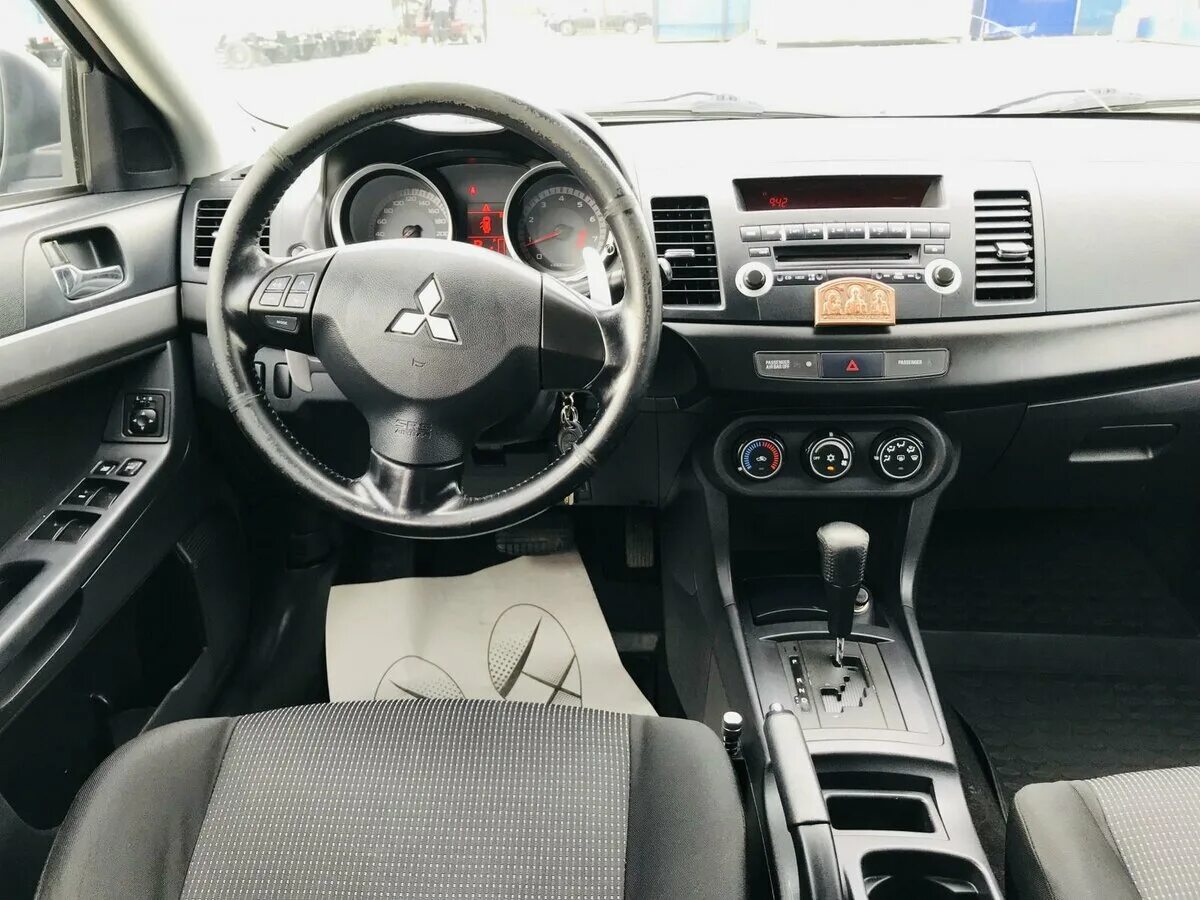 Mitsubishi lancer 2008 года. Lancer 10 2008 автомат. Mitsubishi Lancer 2008 Interior. Митсубиси Lancer 2008. Мафон Мицубиси Лансер 2008.