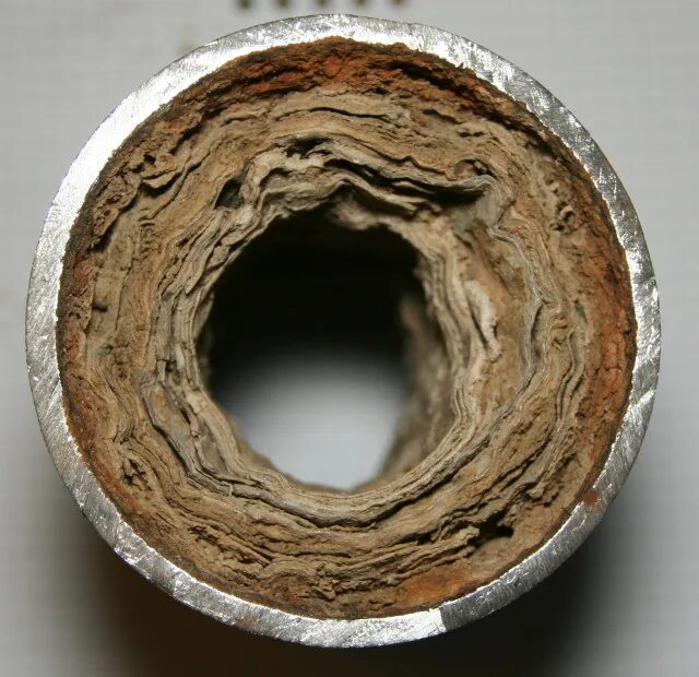 После 3 лет эксплуатации. Старая водопроводная труба в разрезе. Основные средства проводки. Отбеленное дерево. Расчет первоначальной стоимости оборудования.