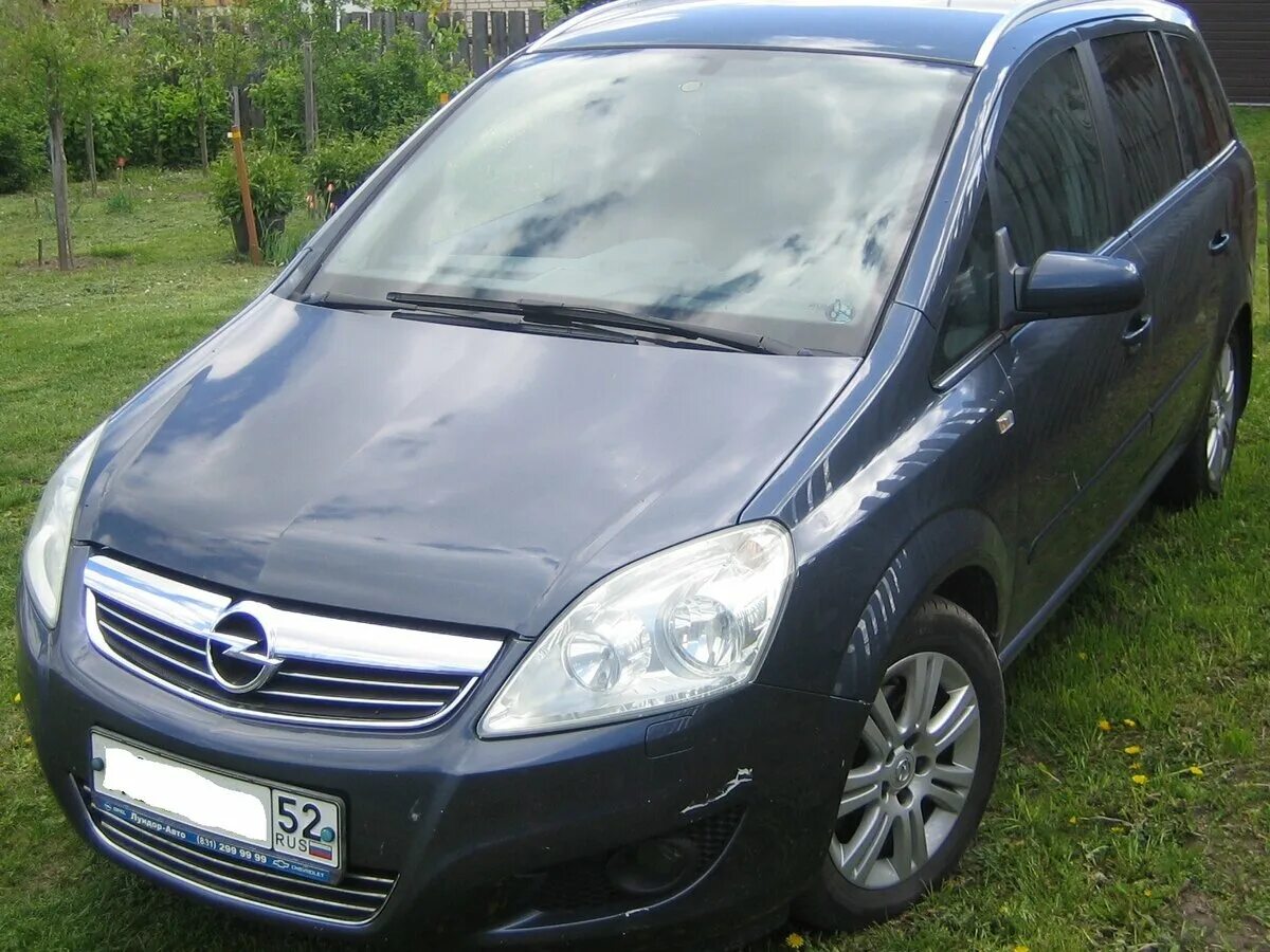 Крыло зафира б. Opel Zafira 2008-2014. Опель Зафира 2008 года темно синий. Опель Зафира 2008 год крыша. Черный Опель Зафира б тюнинг.