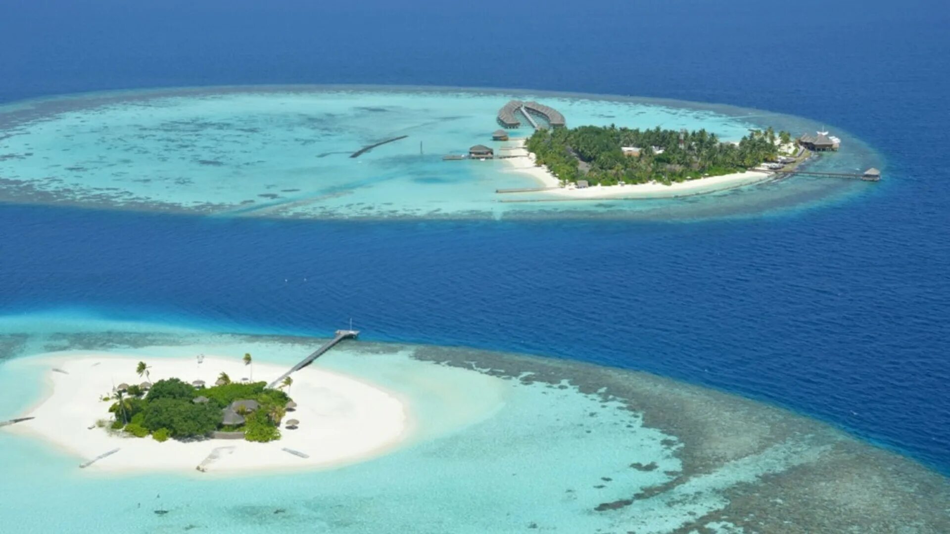 Океан и два острова. Мальдивы Maafushivaru. Шавиани Атолл Мальдивы. Маафушивару Мальдивы. Атоллы Мальдивских островов.