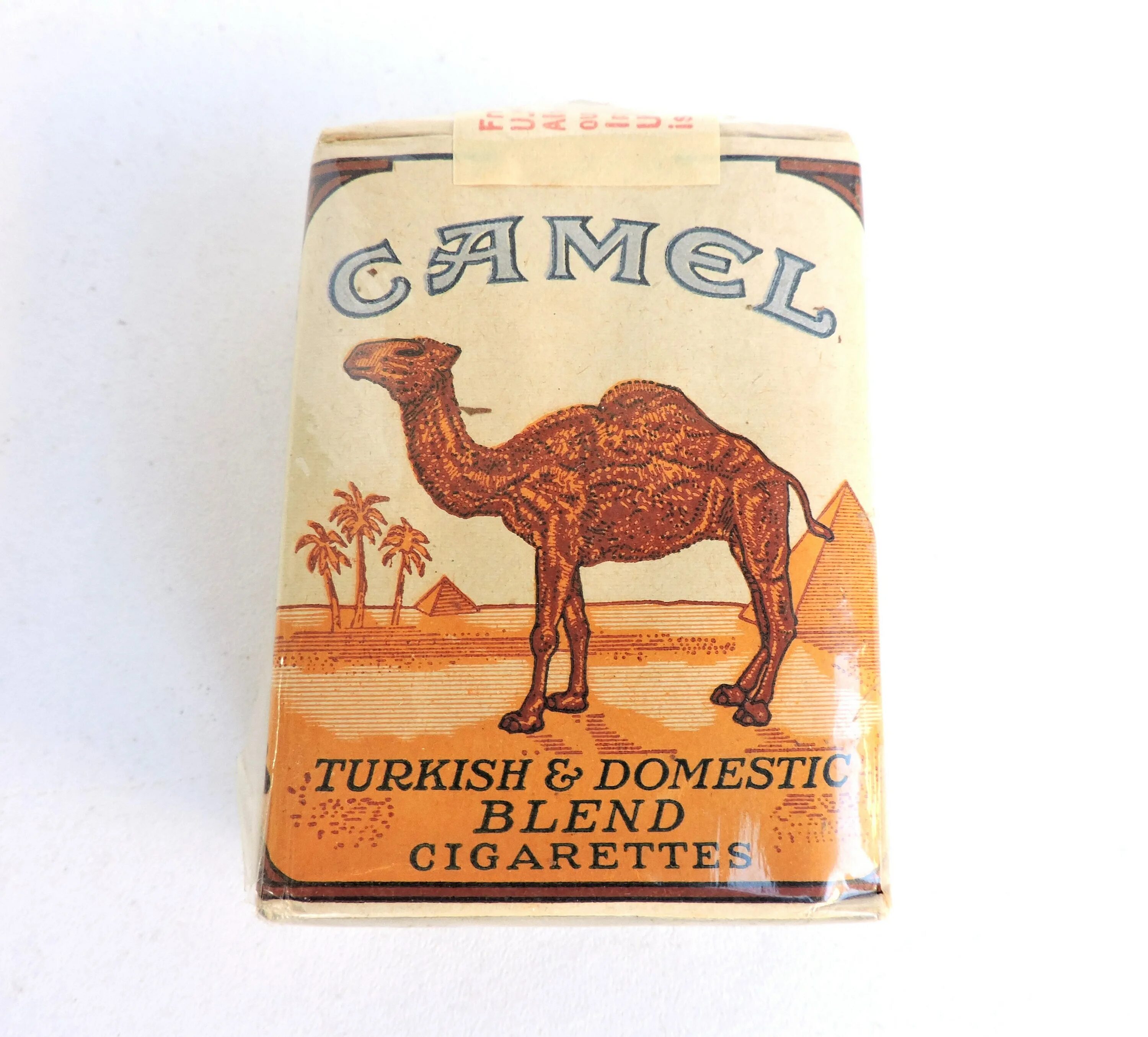 Camel 1913 пачка сигарет. Кэмел мужик на пачке кэмел. Сигареты кэмел КС. Кэмел синий сигареты 2022. Camel перевод на русский