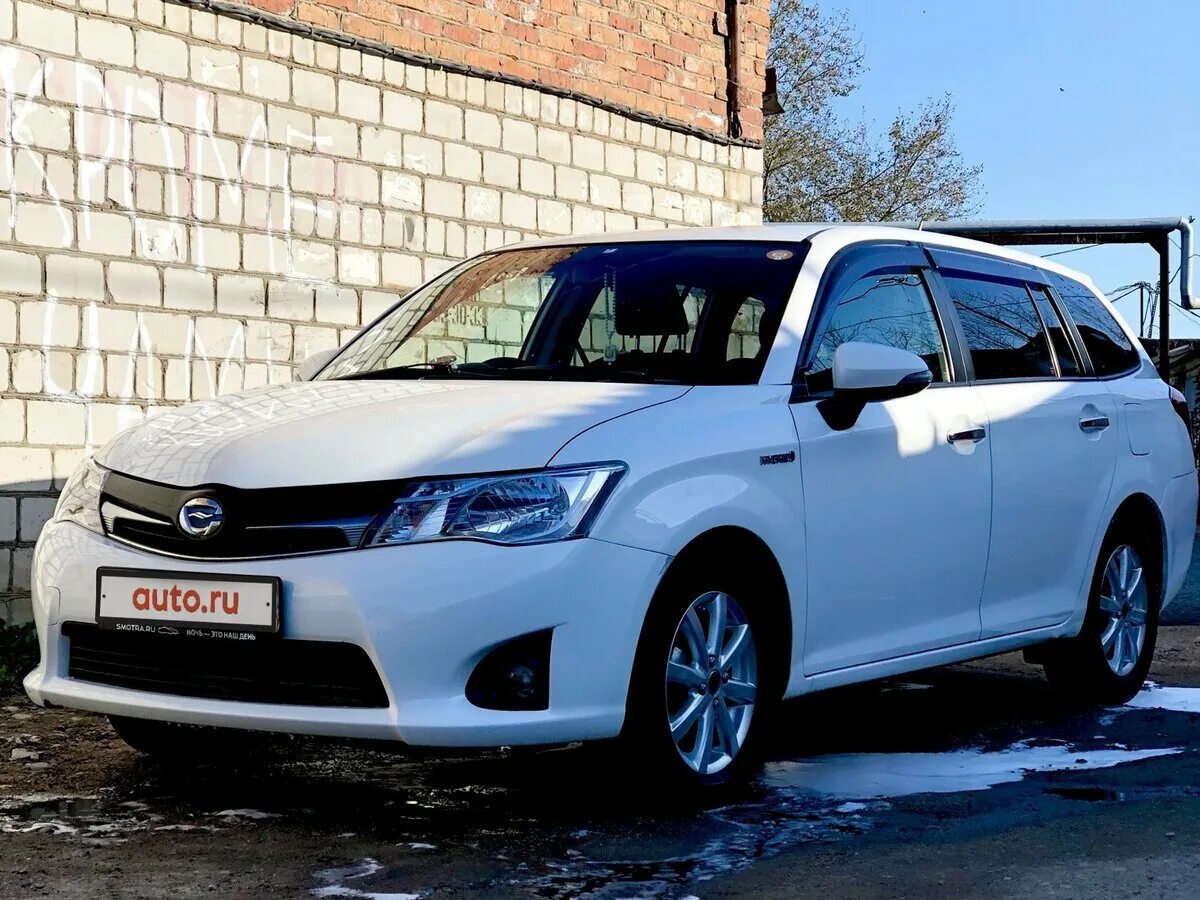 Toyota Corolla Fielder 2014. Тойота Королла Филдер 2014 гибрид. Тойота Филдер гибрид 2014. Toyota Corolla Fielder e160. Купить тойота филдер пробега по рф