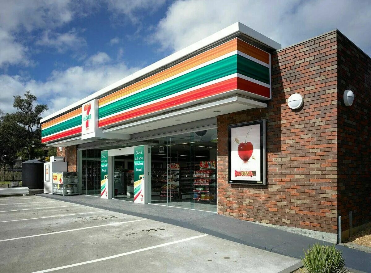 New shop build. Севен Элевен Америка. Севен Элевен фасад. 7 Eleven магазин. Севен Элевен магазины США.