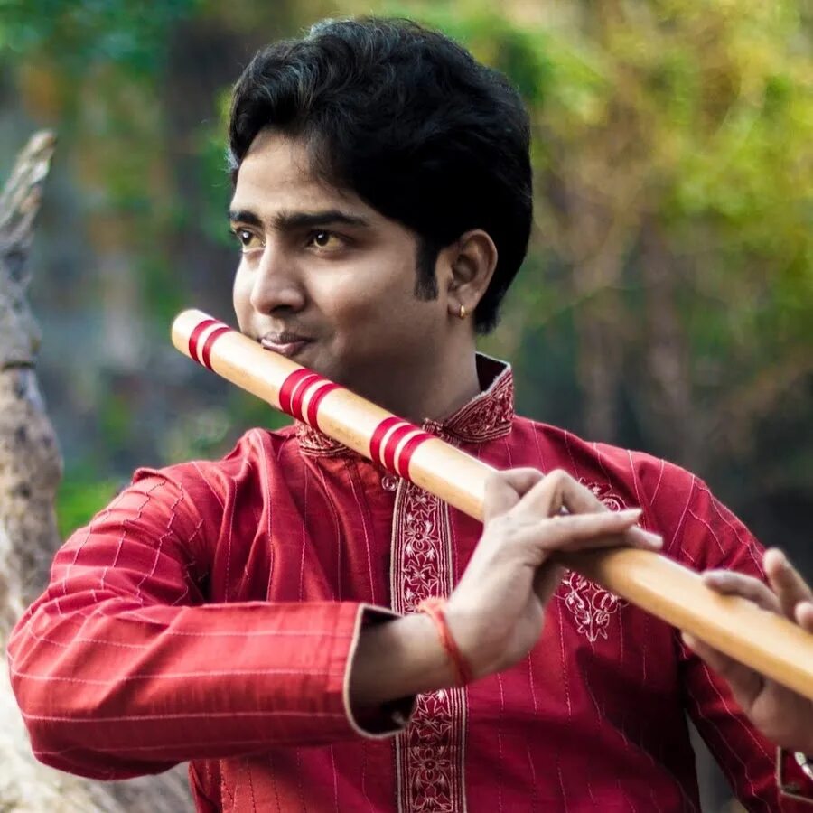 Индийский флейта музыка. Бансури. Индийский музыкальный инструмент бансури. Бансури флейта. Бансури инструмент Индия.