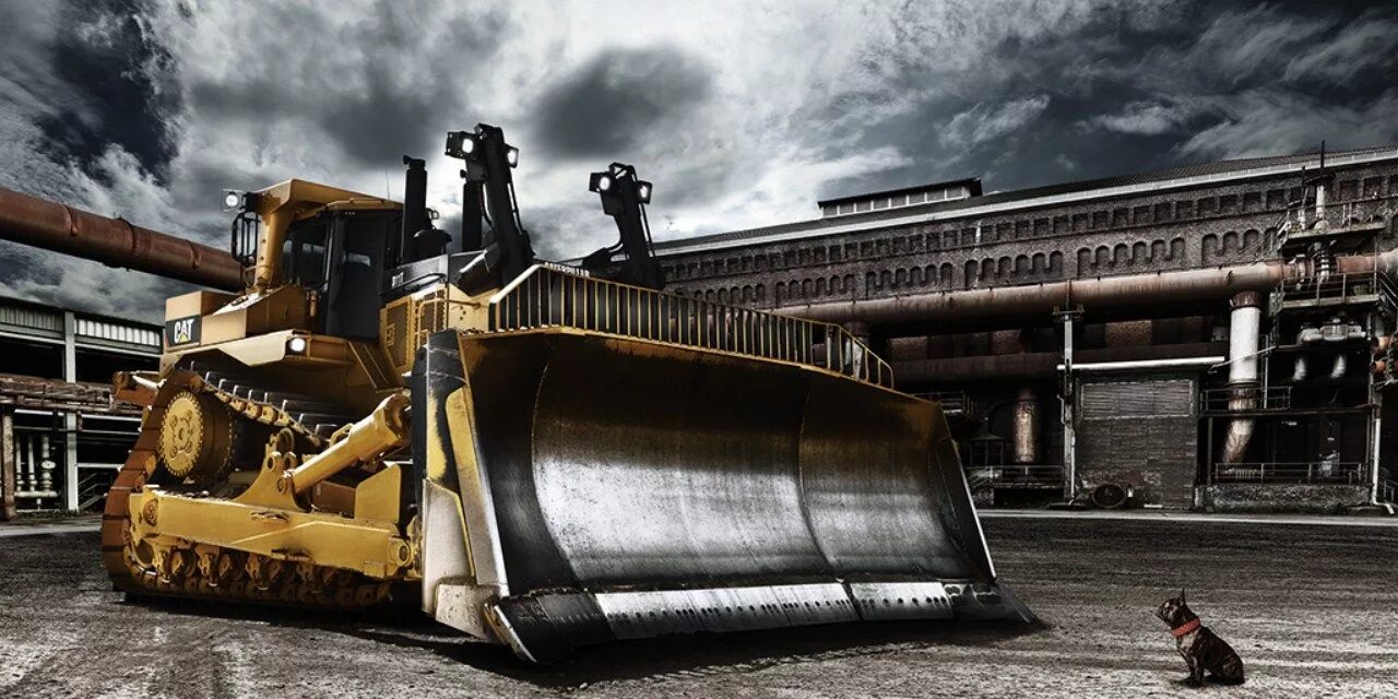 Первая строительная техника. Бульдозер Cat d11. Катерпиллер бульдозер. Caterpillar d11t. Самый большой бульдозер Катерпиллер.