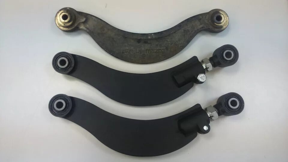 Серповидные рычаги мазда сх7. Серповидные рычаги мазда сх7. Мазда сх7 задние рычаги. Nissan murano рычаг задний поперечный левый декоративная панель. Серповидные рычаги мазда сх7.