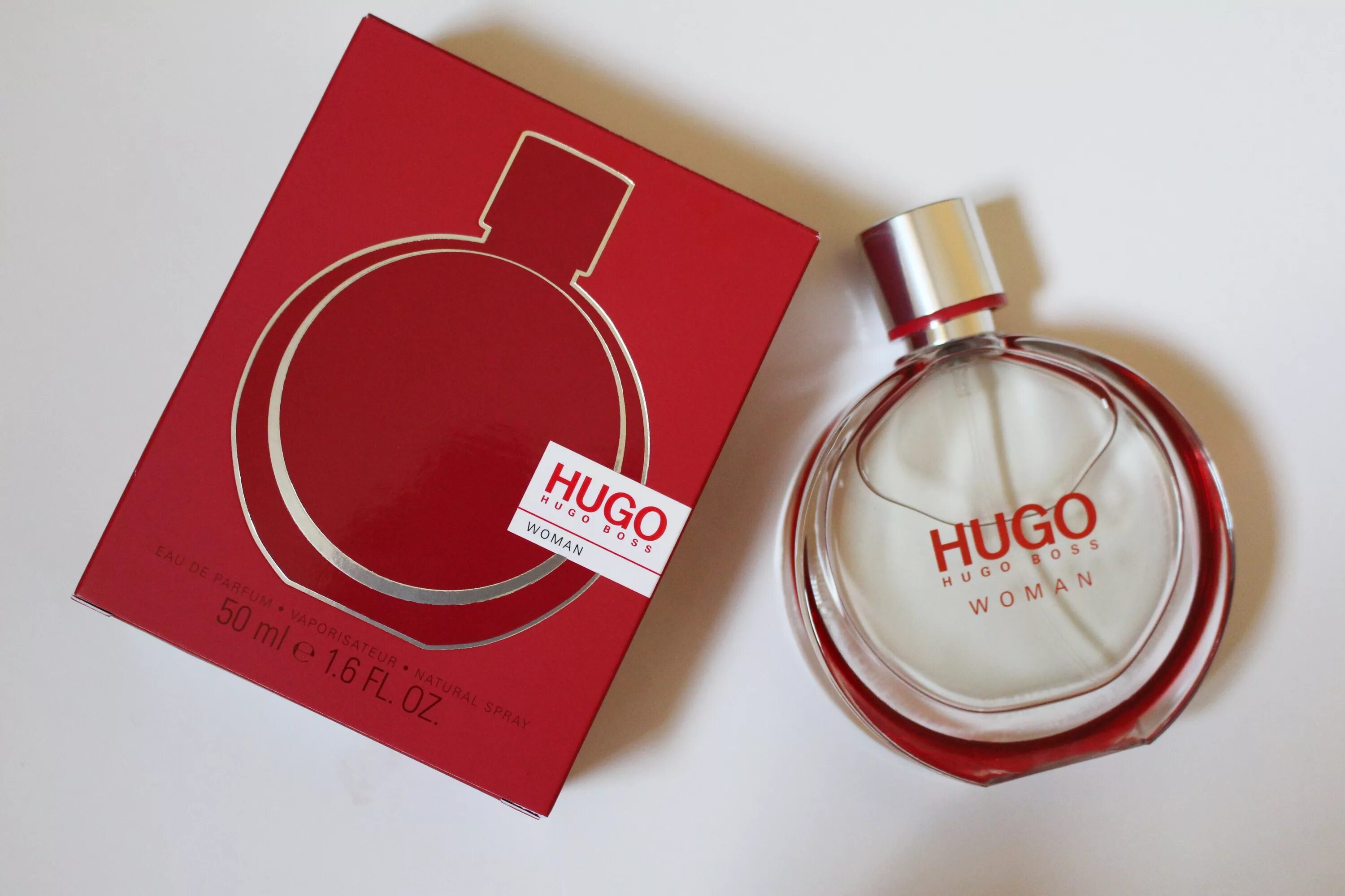 Hugo woman парфюмерная. Hugo Boss Hugo woman 75 мл. Хьюго босс Вумен. Hugo Boss Hugo woman Eau de Toilette. Boss Hugo Hugo Deep Red for woman (жен) EDP 50 мл.