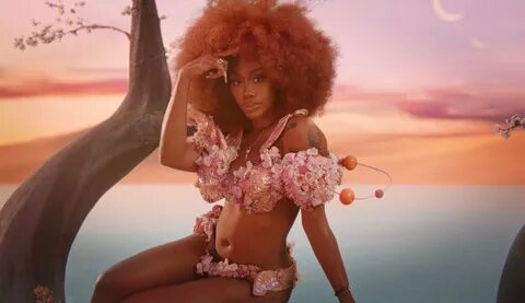 Doja Cat & SZA welcome us to Planet Her on Kiss Me More 