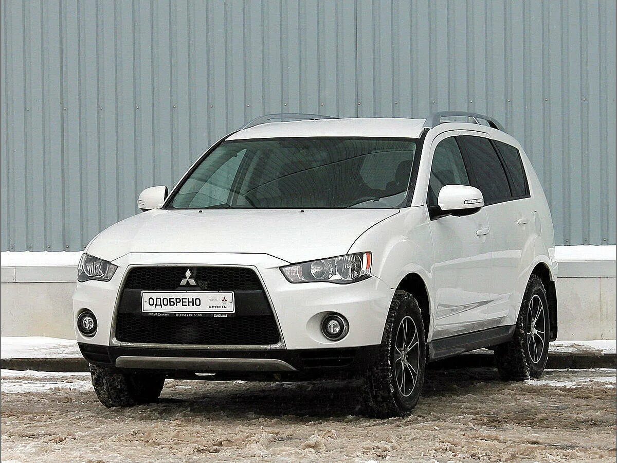 Митсубиси Аутлендер 2010. Аутлендер XL 2010. Mitsubishi Outlander XL 2010 Рестайлинг. Белый Митсубиси Аутлендер XL. Мицубиси аутлендер хл 2010