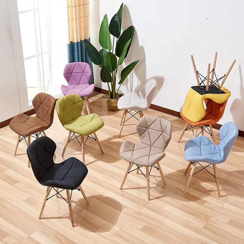 В комнате есть стулья. Стул еамес баттерфляй. стул eames butterfly. стул eames butterfly серый. современные стулья.