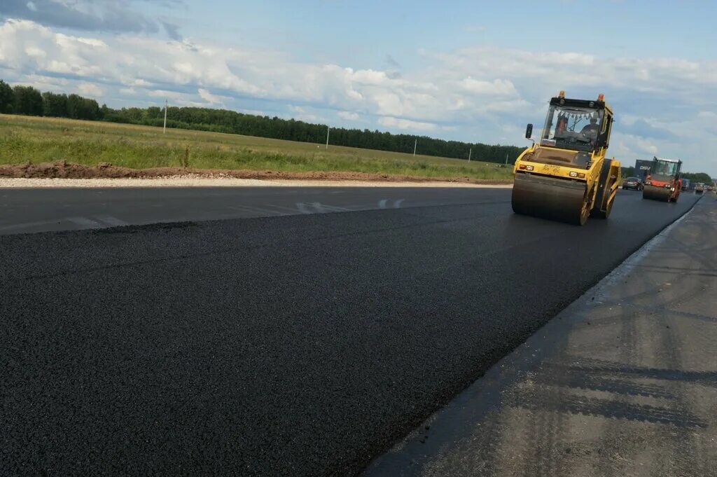 Строительство городских дорог. Асфальтирование дорог. Укладка дороги. Стройка дороги. Укладка асфальта.