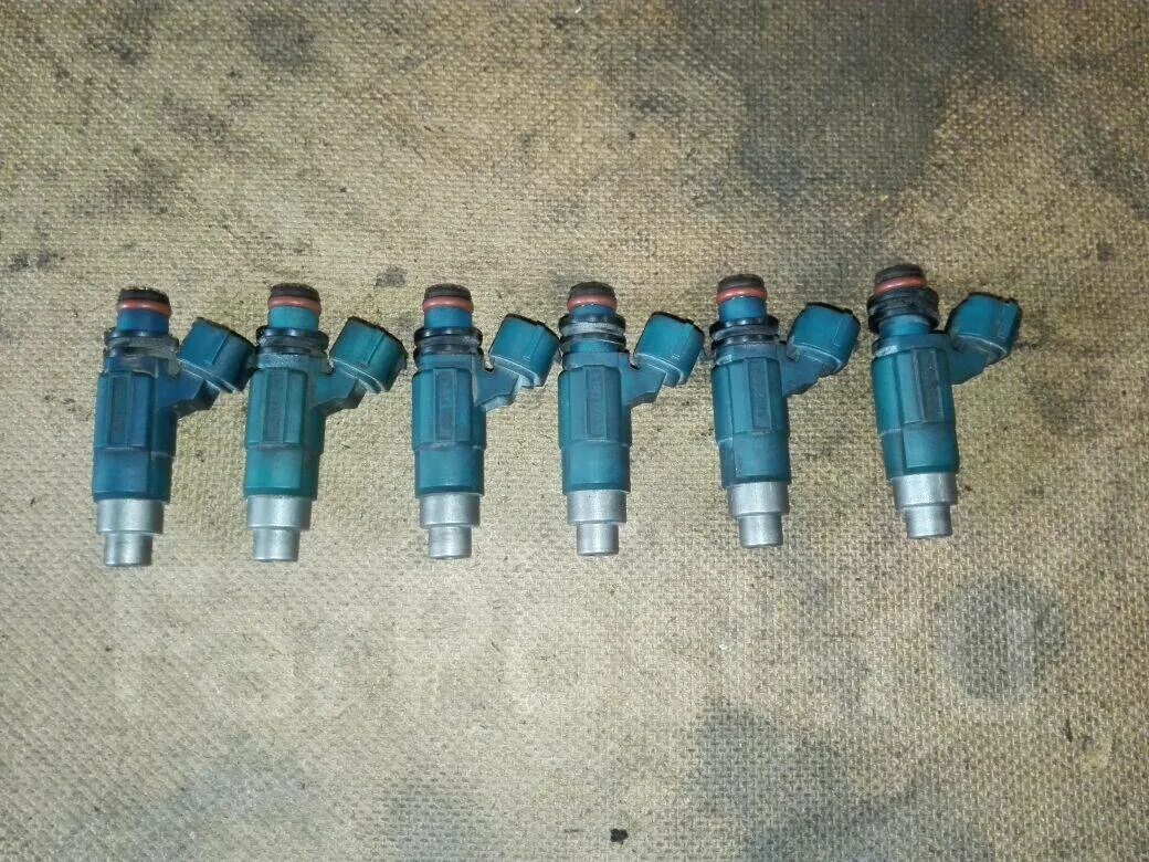 Форсунки двигателя митсубиси. Форсунки митсубиси лансер 9 1. 5. Форсунки топливные митсубиси лансер. Форсунка 4g63 топливная.