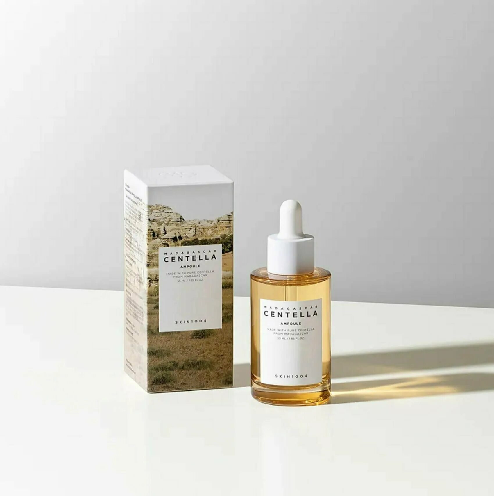 Skin 1004 сыворотка. Сыворотка 1004. Сыворотка с центеллой madagascar centella ampoule 100мл. Увлажняющая сыворотка с центеллой skin1004 madagascar centella hyalu-cica blue serum. Сыворотка 1004.