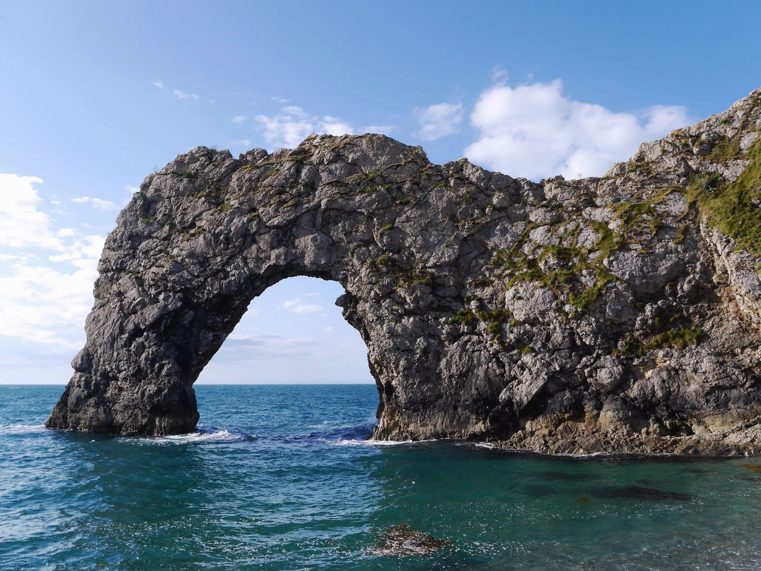 Арка горы. Бельдиби каменная арка. Греция Лутраки грот арка. Кейп-Дорсет. Мыс Дорсет.