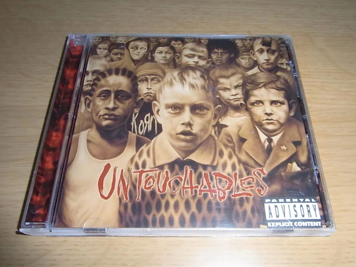 Korn untouchables. Korn untouchables 2002. korn альбом untouchable. korn untouchables обложка. korn untouchables album cover.
