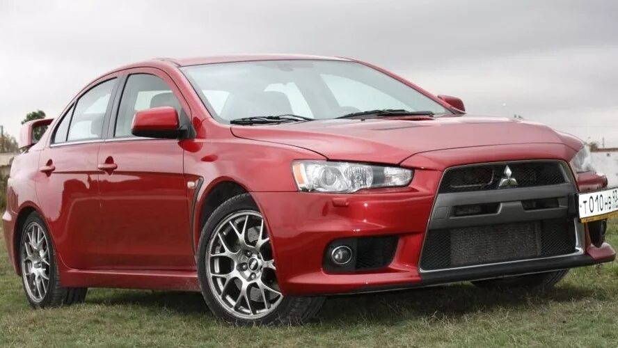 Лансер 10 отзывы владельцев. Mitsubishi Lancer Evolution 10 диски. Лансер Эволюшн 11. Lancer EVO 10 диски. Диски Лансер 10 Эволюшн.