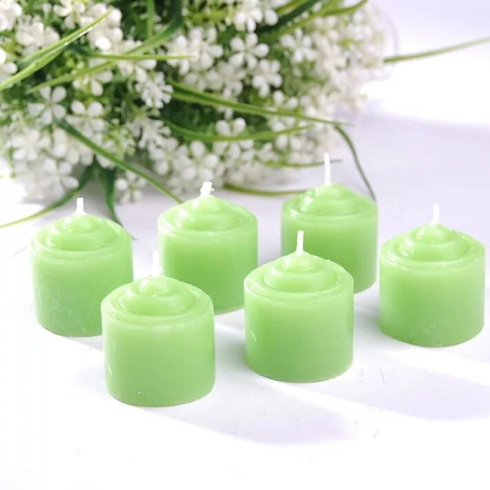 Свечи зеленого цвета. Свеча зеленая. Свеча зеленого цвета. Свеча на зеленом фоне. Большие свечи зеленые.