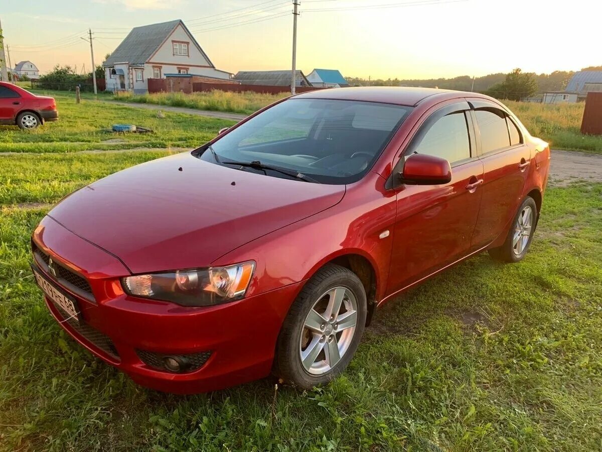 Mitsubishi саратов. Митсубиси Лансер 10 красный. Мицубиси красная 2005 и 2008 год. Мицубиси акула 2008 года. Мицубиси седан красный.