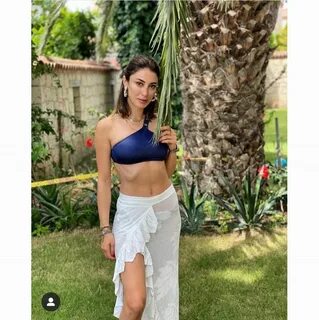 Bikinisiyle objektiflere poz veren Oflaz'ın son dönemde verdiği kilola...