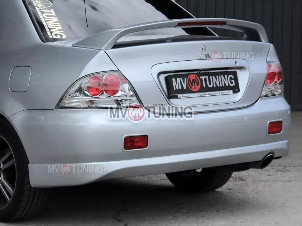 Задний бампер лансер 9. Юбка заднего бампера sport 2.0 mitsubishi lancer 9 (2003-2009). задний бампер mitsubishi lancer ix в стиле evo (2003-2009). лансер 9 задний бампер accolade. mitsubishi lancer 9 задний бампер.