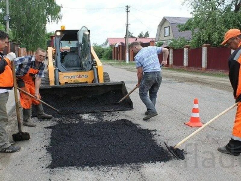 Ремонт дороги асфальта