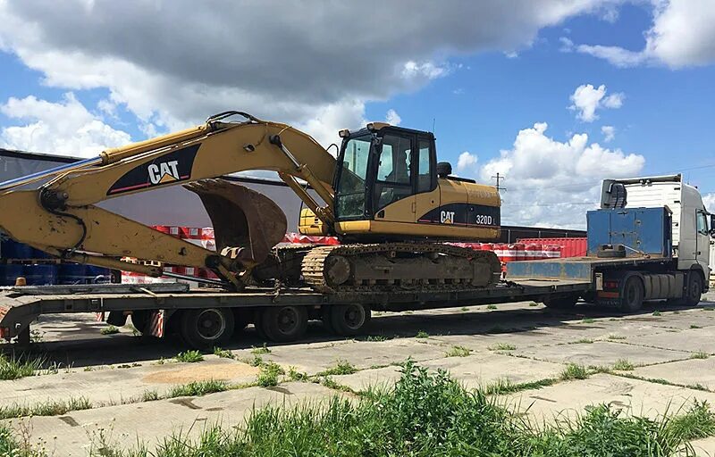 Экскаватор JCB 360 на трале. Комацу 400 на на трале. PC-400 Komatsu на трале. Caterpillar 349 на трале. Доставка экскаватора