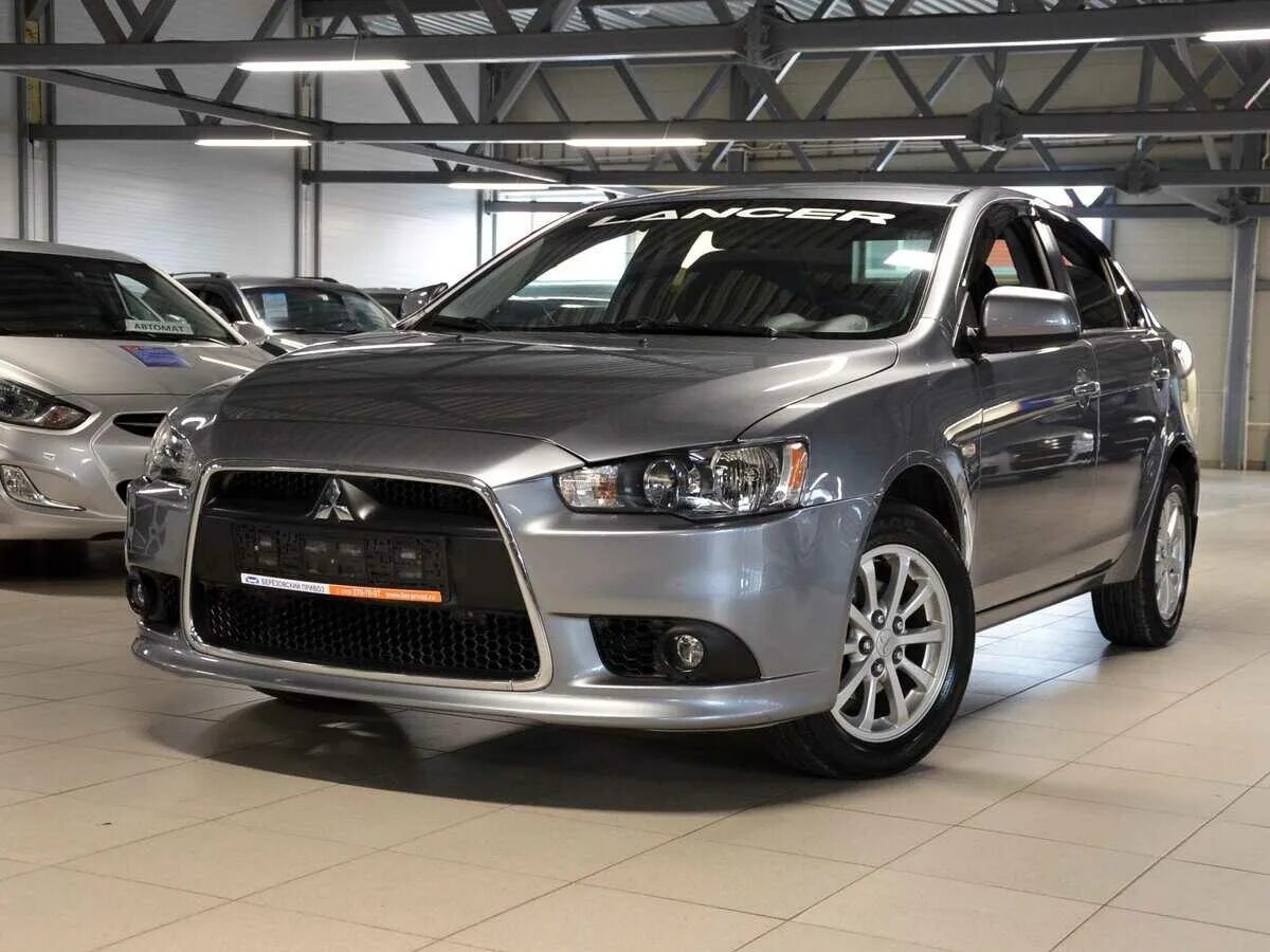 Mitsubishi lancer 10 поколения. Mitsubishi Lancer x Рестайлинг 2012. Лансер 10 HTCN. Митсуби ИСИ лансер10 рест. Митсубиси Лансер 10 Рестайлинг.