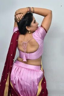 Anchor Indu hot stills in half saree 