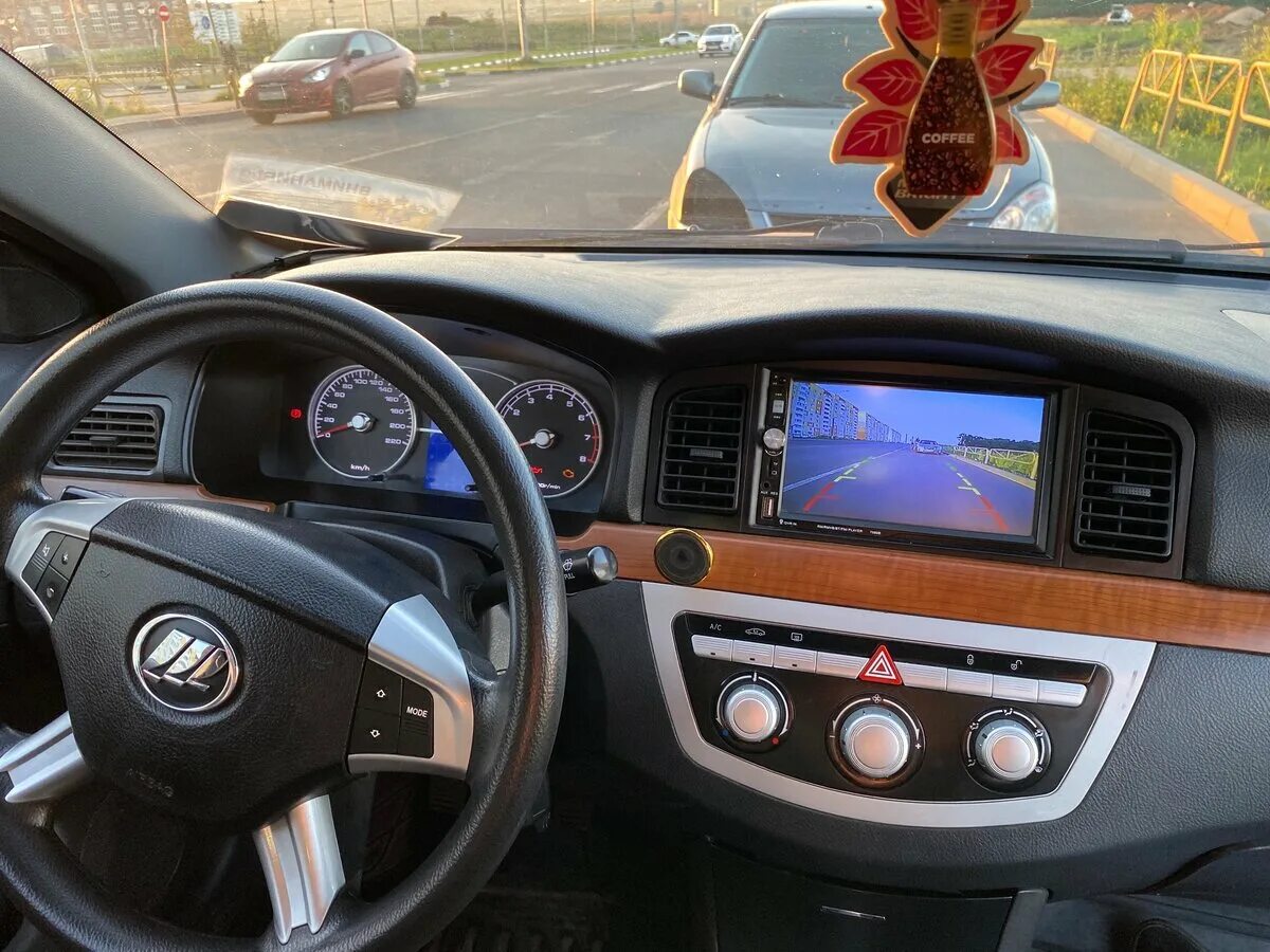 Андроид лифан солано 620. Андроид лифан солано 620. Лифан солано 620 салон. Автомагнитола лифан солано 620. Рамка под магнитофон лифан солано.