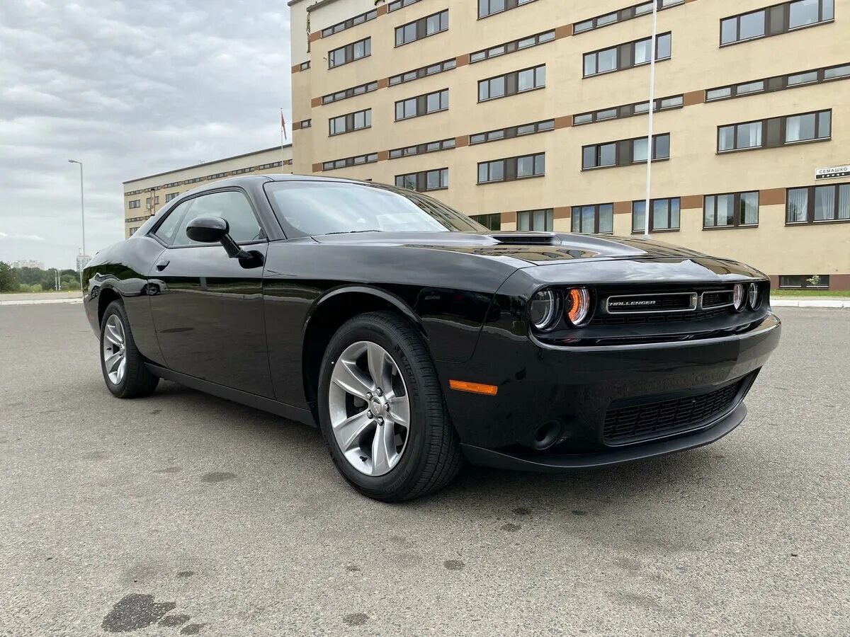 Dodge минск. Dodge challenger iii рестайлинг 2. Додж челленджер на площади ленина донецк. Dodge минск. Dodge минск.
