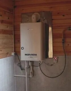 Установка газового котла на деревянной стене