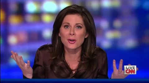 Erin Burnett Wearing Tight Silk& Satin Blouses On CNN’s Erin Burnett.