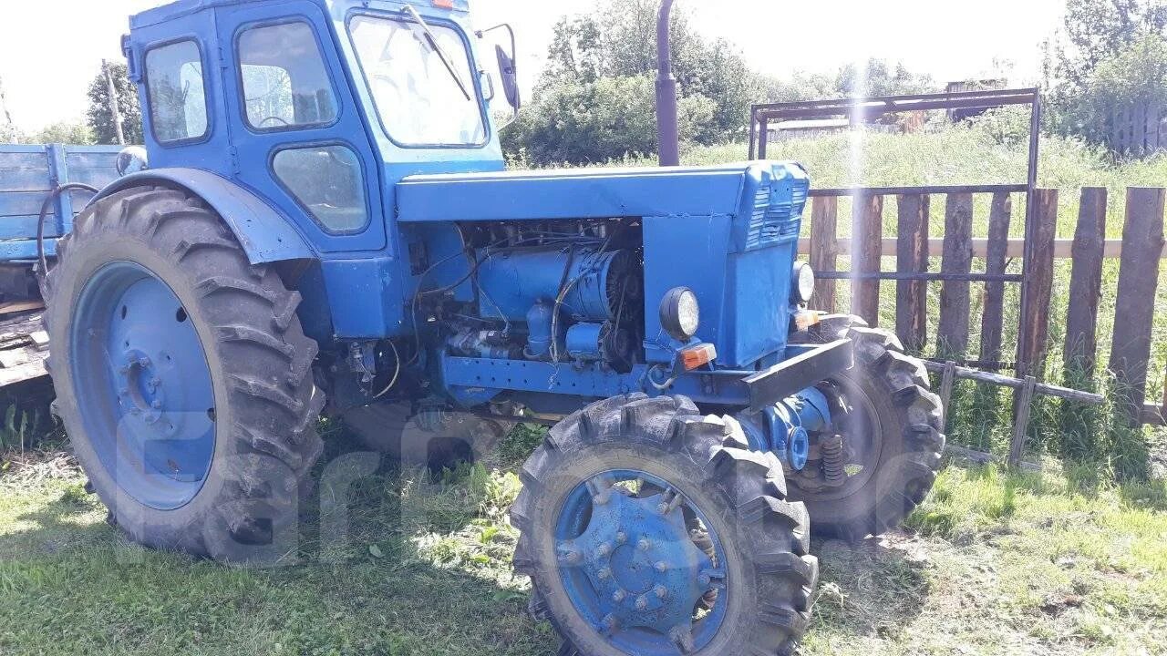 Авито т 40 свердловская область. Т-40 ам трактор с косилкой. Трактор т 40 красный. Т-40 трактор с консервации. Трактора мтз и т 40.