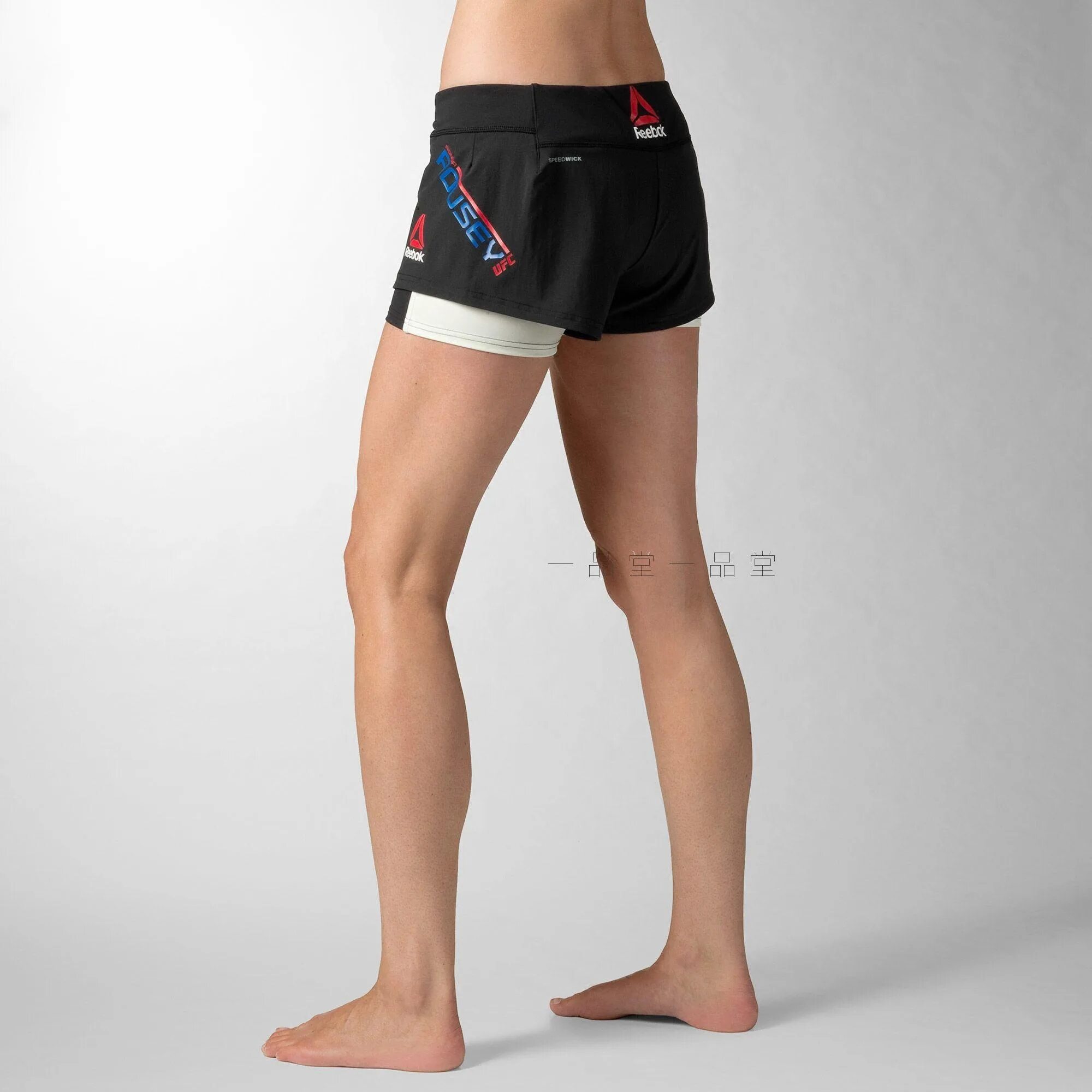 Шорты льюиса. Шорты рибок UFC. Шорты Reebok UFC Octagon. Шорты Reebok UFC FG Capsule Shor. UFC Octagon шорты.