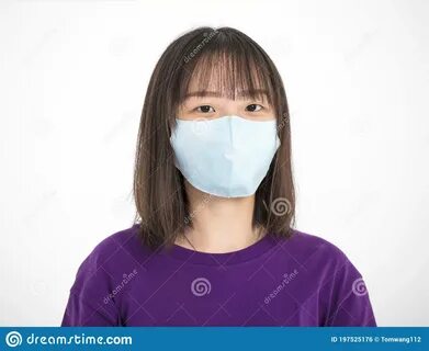 Photo about Asian teenager girl wearing medical face mask. 