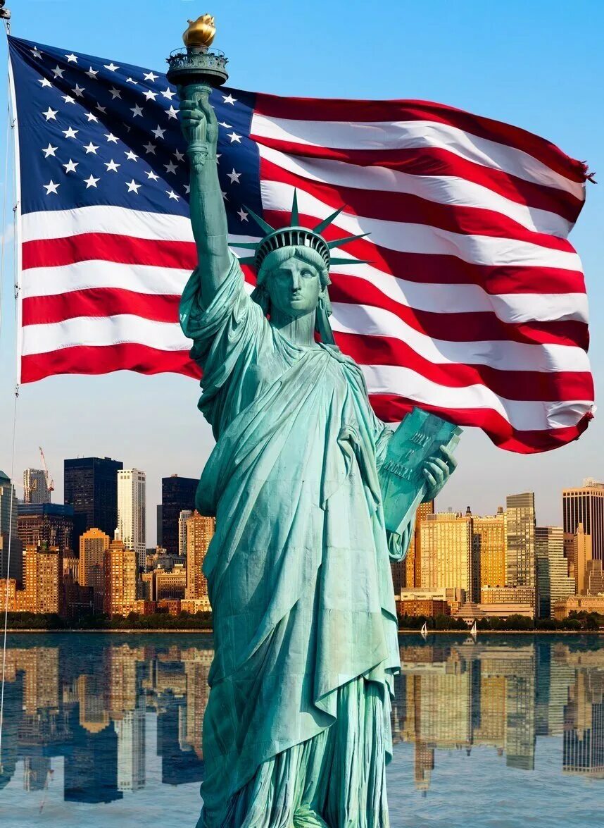 Слова связанные с америкой. США Нью-Йорк статуя свободы. Статуя свободы Нью-йор. Статуя свободы Нью-Йорк фото. Статуя свободы Нью-Йорк американский флаг.