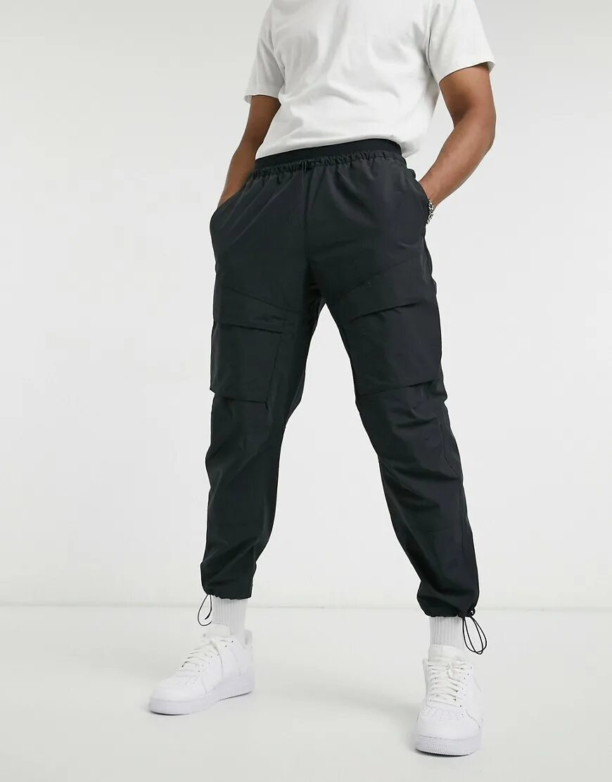 Брюки Nike Tech Woven. Брюки Nike Tech Pant Woven. Брюки Nike Tech Pack Cargo. Брюки Nike NSW Cargo.