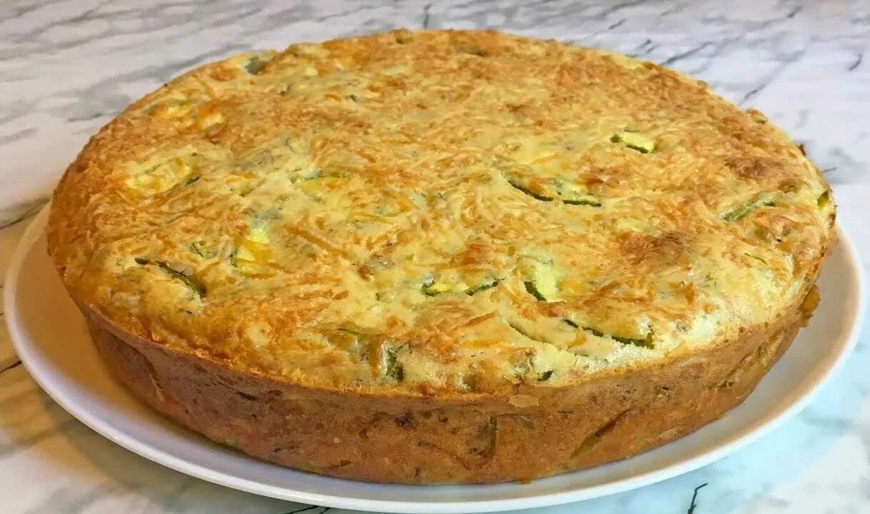 Киш лорен с овощами. Заливной пирог с кабачками. Пирог с кабачками и сыром. Пирог из кабачков. Рецепт кабачков пирог.