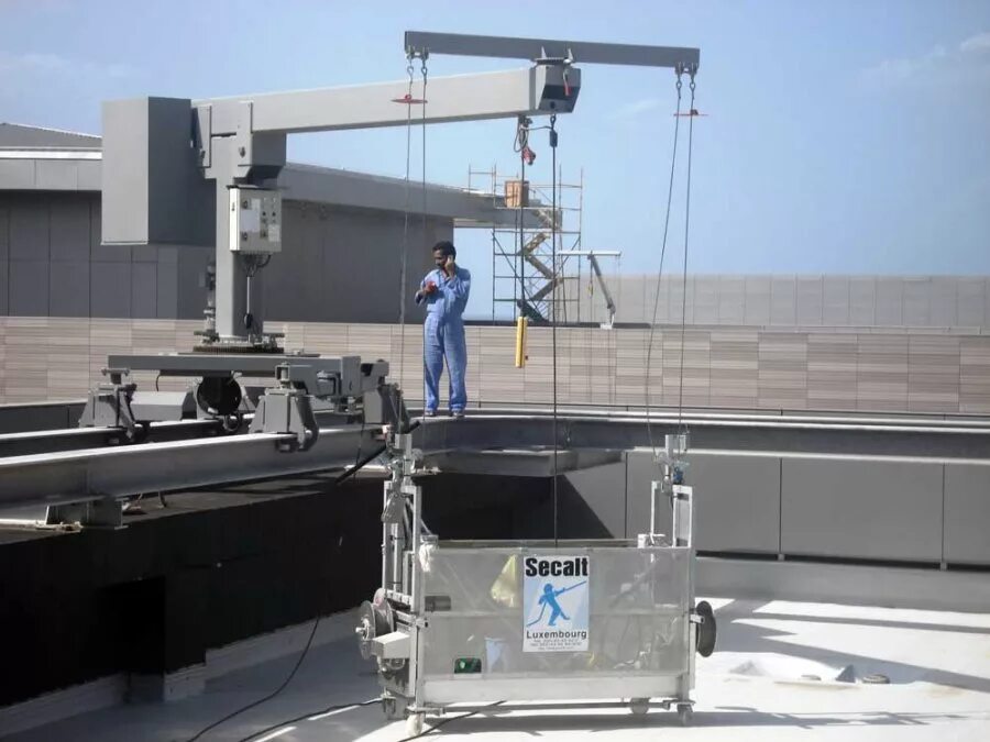 системы обслуживания фасадов. лахта система обслуживания фасада. подъемник фасадный geda bmu f-th-3-s. ограждение для обслуживания фасадов. монорельсовая система обслуживания фасадов.