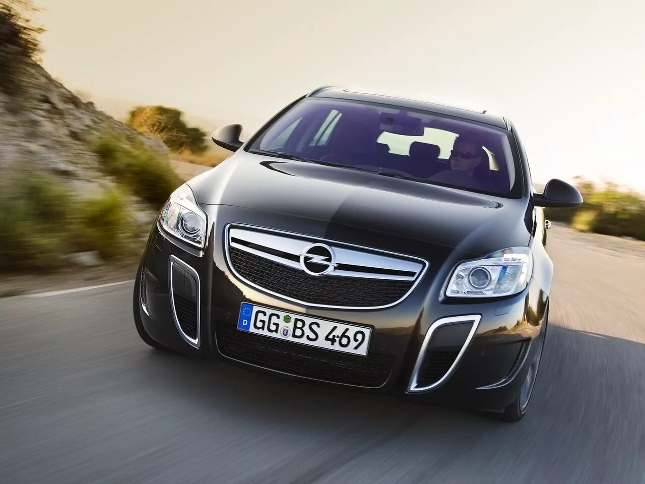 Марка опель фото. Opel insignia opc. опель инсигния opc универсал. opel insignia opc 2009. opel insignia opc 2010.