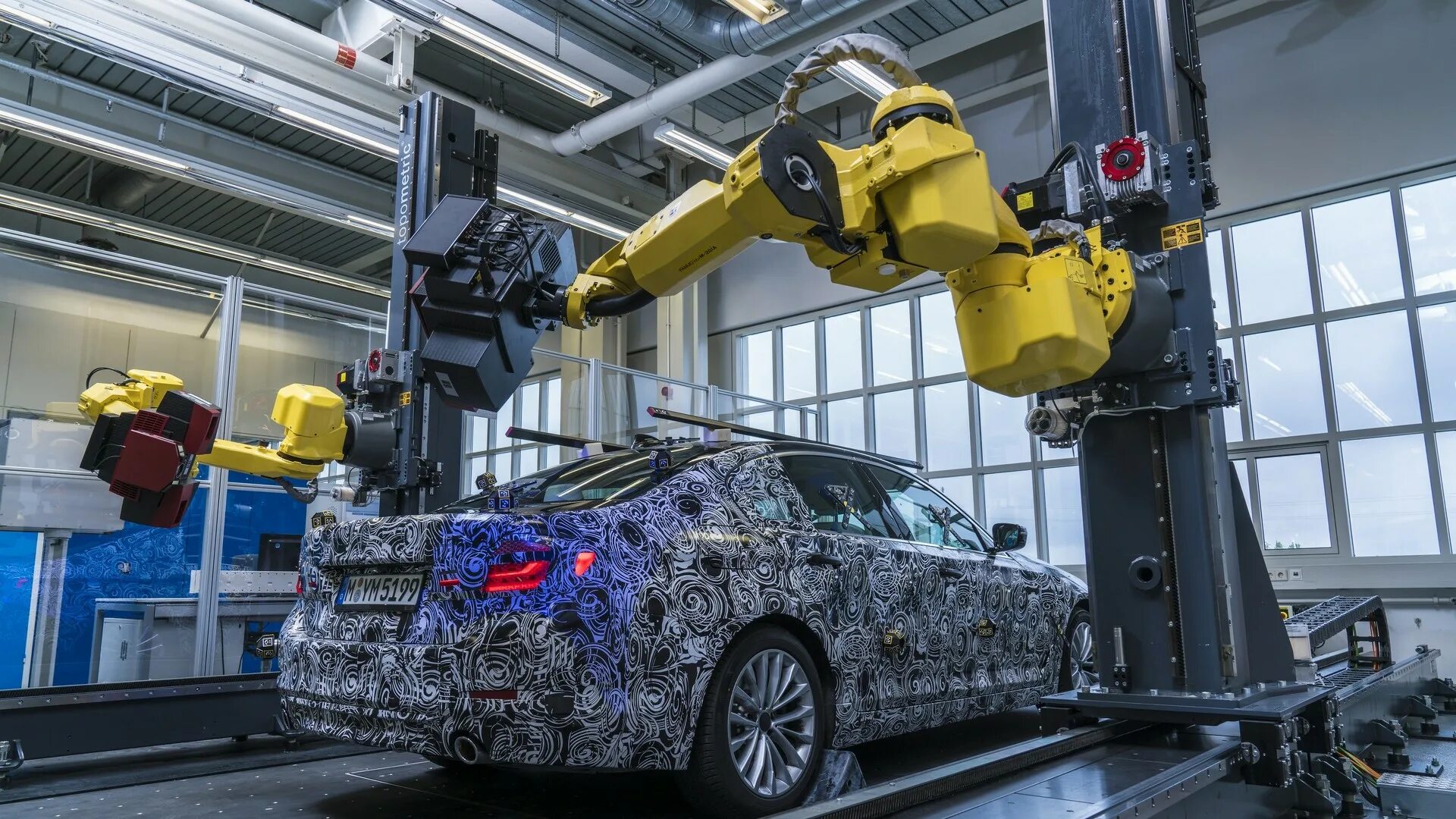 Создание машины. Автомобильная промышленность. роботизированные машины. робот для сборки автомобилей. роботы в автомобильной промышленности.