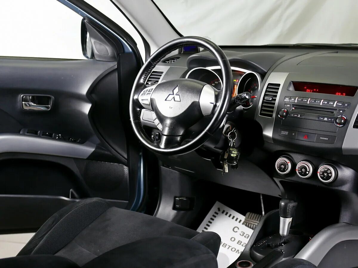 Mitsubishi outlander двухлитровый. Mitsubishi Outlander 2.4 2008. Аутлендер ХЛ 2.4 2008. Аутлендер 2008 2.4. Митсубиси Аутлендер 2008 2.4 механика.