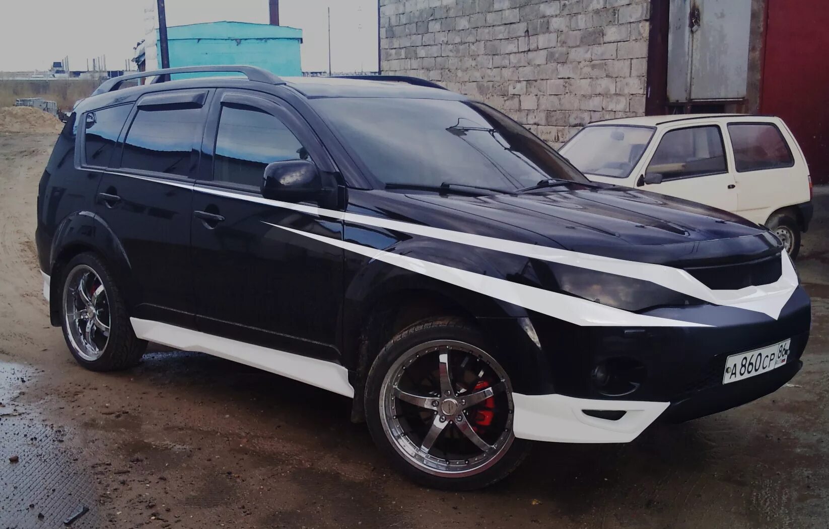 Mitsubishi Outlander XL 2.4 бензиновый 2011 на DRIVE2