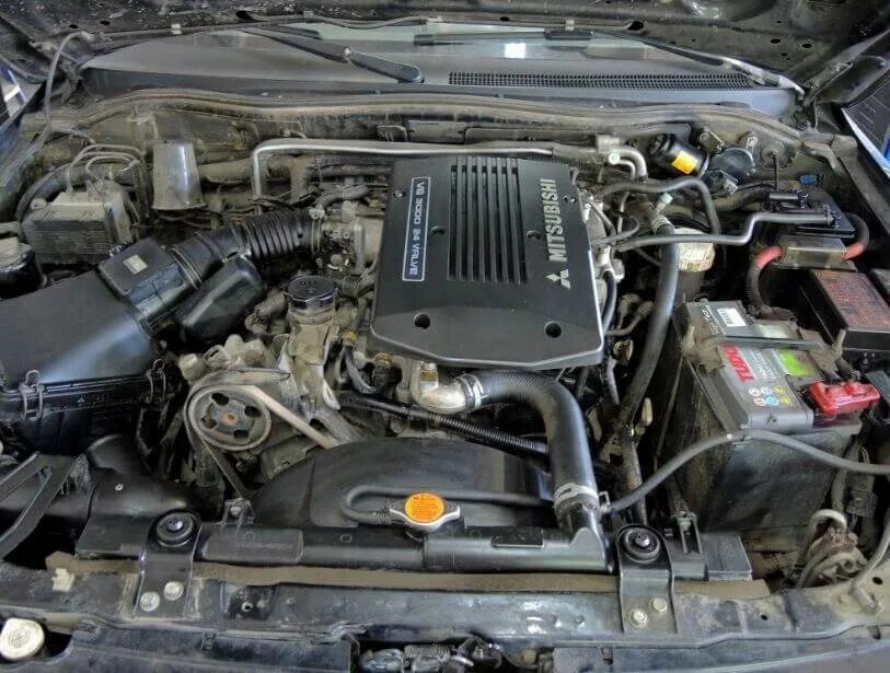 Монтеро спорт замена. V6 Pajero Sport. Воздушный фильтр Митсубиши Паджеро спорт 3. Mitsubishi Pajero v6. ДВС Митсубиси Паджеро спорт.