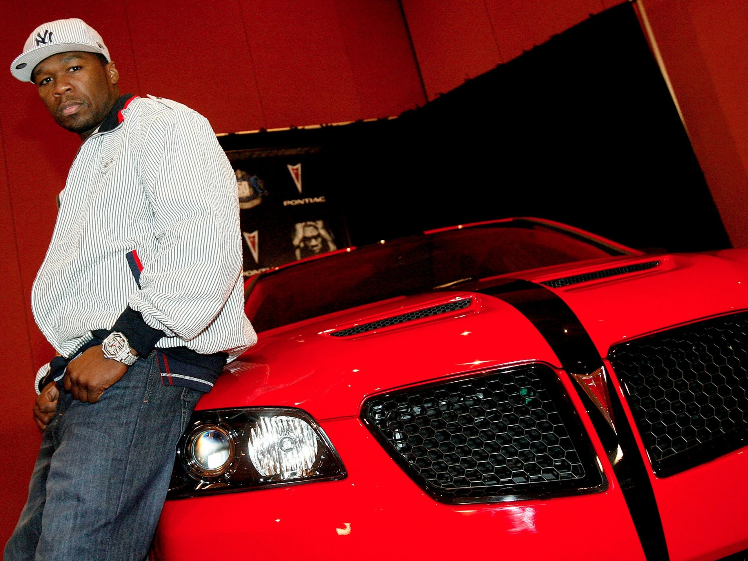 He got a new car. Рэпер 50 Cent. Машины 50 Cent. Первая машина 50 Cent. Кадиллак 50 Cent.