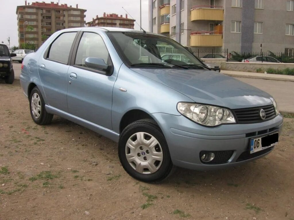 4. Фиат альбеа на газ. Фиат альбеа 2009. Fiat albea 2002. Установка гбо фиат добло.