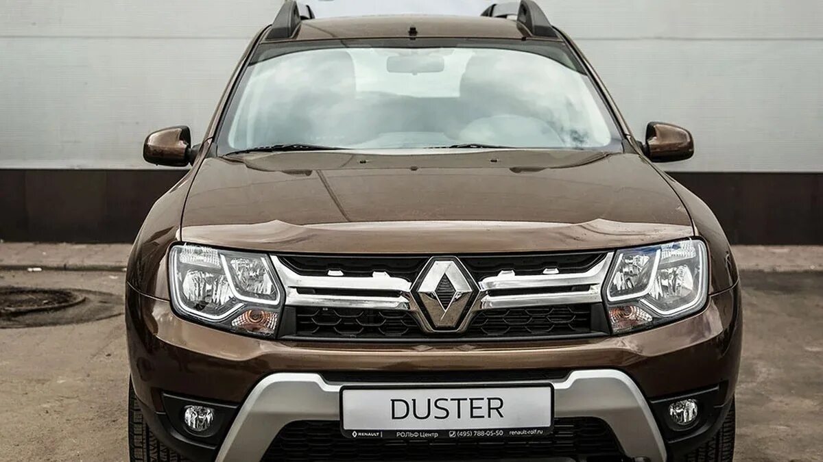 Купить рено дастер 2015 год. Renault Duster коричневый. Рено Дастер 2014 коричневый. Duster 2 Рестайлинг. Renault Duster 1 Рестайлинг.