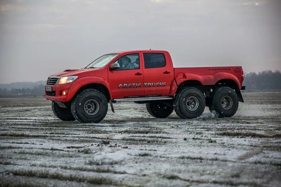 Пикап трое. Toyota Hilux Arctic Trucks at38 6x6. Тойота Hilux Arctic Trucks 6x6. Hilux Arctic Trucks. Arctic Trucks Toyota Hilux 6 6.