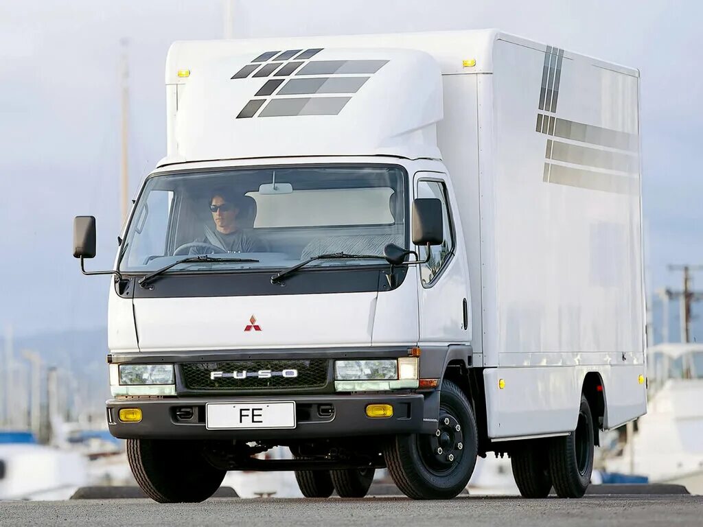 Мицубиси грузовик. Mitsubishi Fuso Canter. Мицубиси Фусо Кантер. Mitsubishi Canter 1993. Mitsubishi Fuso 1993.